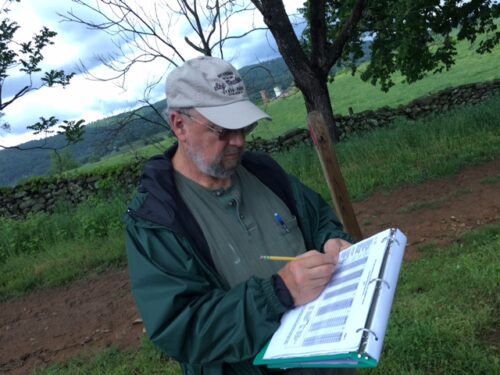 A volunteer records bluebird nesting data at Sky Meadows State Park. Photo credit: Shenandoah Master Naturalists